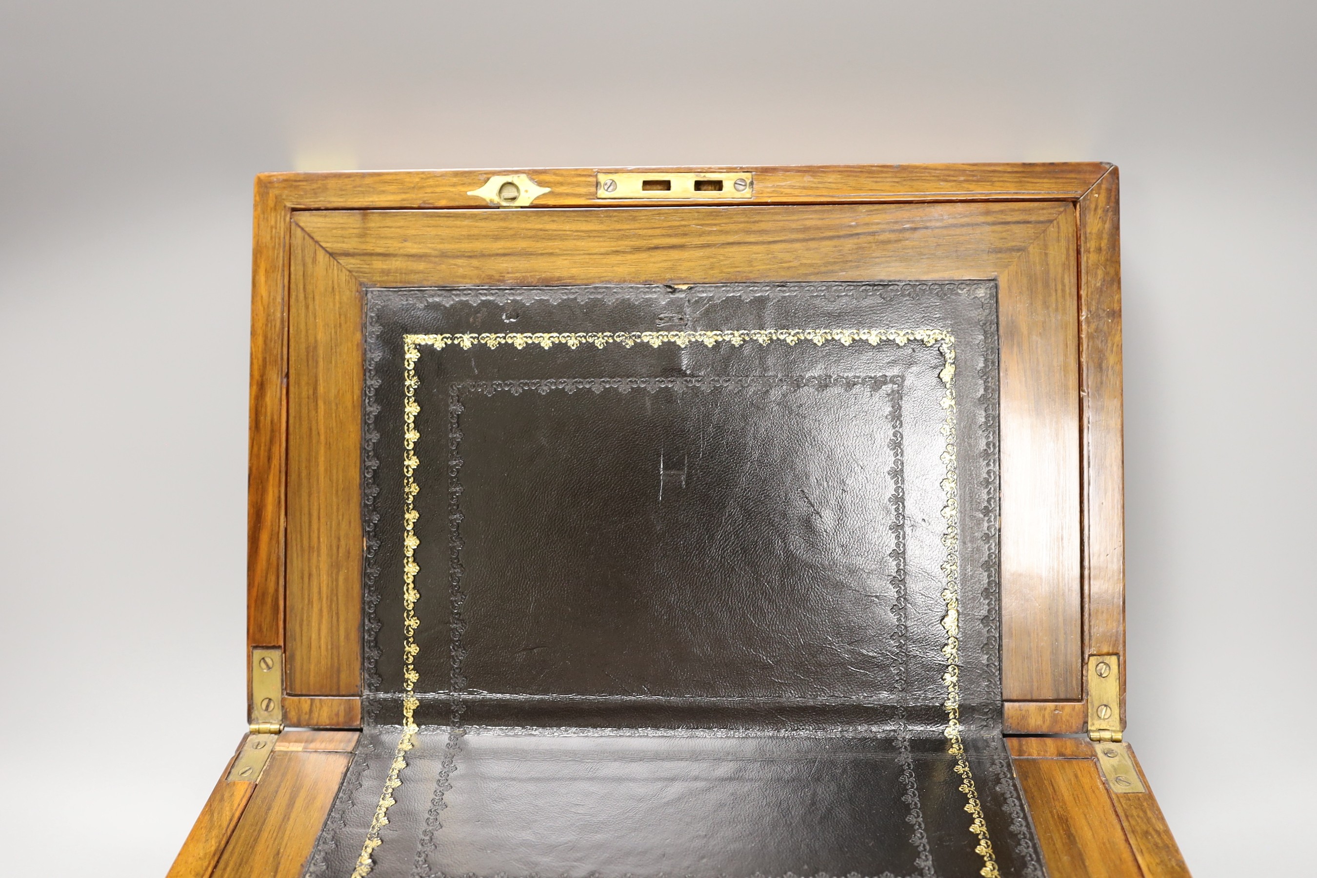 A small early 20th century brass bound mahogany writing slope, 35cm